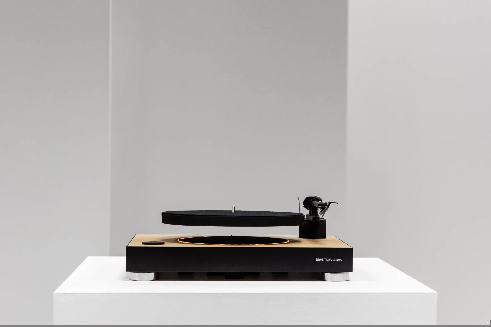Though this photo shows the platter levitating when the tonearm is at rest, Mag-Lev Audio says that feet will rise to support the platter in such cases