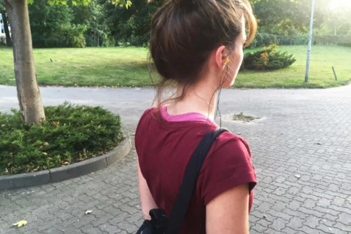 A user models the EarFS ear plug