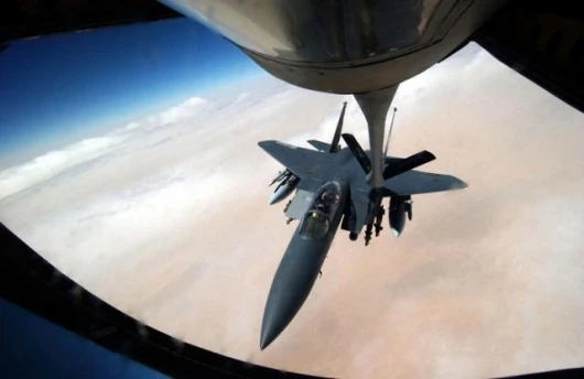 An F-15E Strike Eagle from the 494th Fighter Squadron at Royal Air Force, is refueled by a KC-135 Stratotanker from the 340th Expeditionary Air Refueling Squadron during Operation Iraqi Freedom.