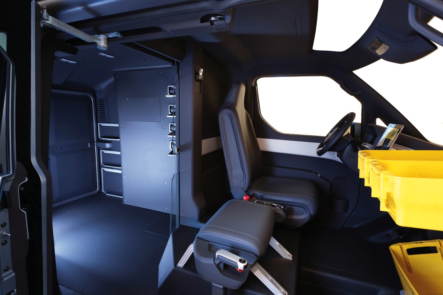 The passenger side features an electric sliding door that opens in two stages for quick walk-on access, reducing the need for walking around the vehicle. For even quicker turnaround, the passenger side features a standing seat.
