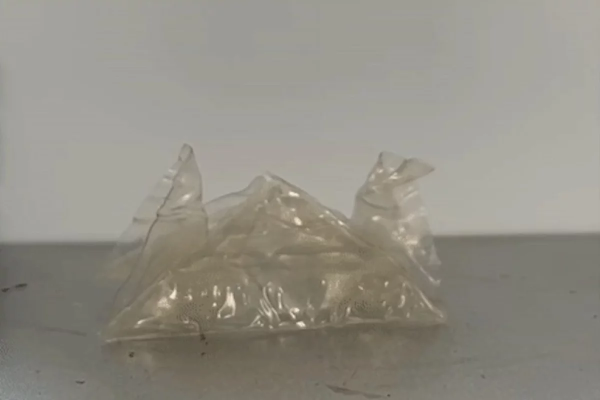 A sample of the new VPR plastic, which has returned to its origami crane shape after being flattened then heated