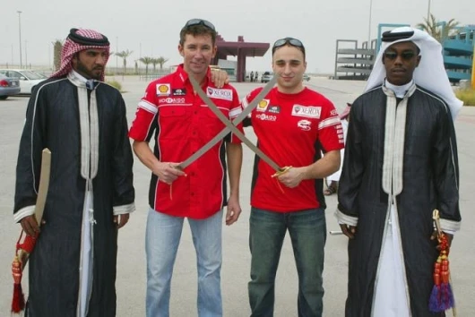 The Ducati Xerox team of Bayliss and Lanzi and some locals - more neat swords!