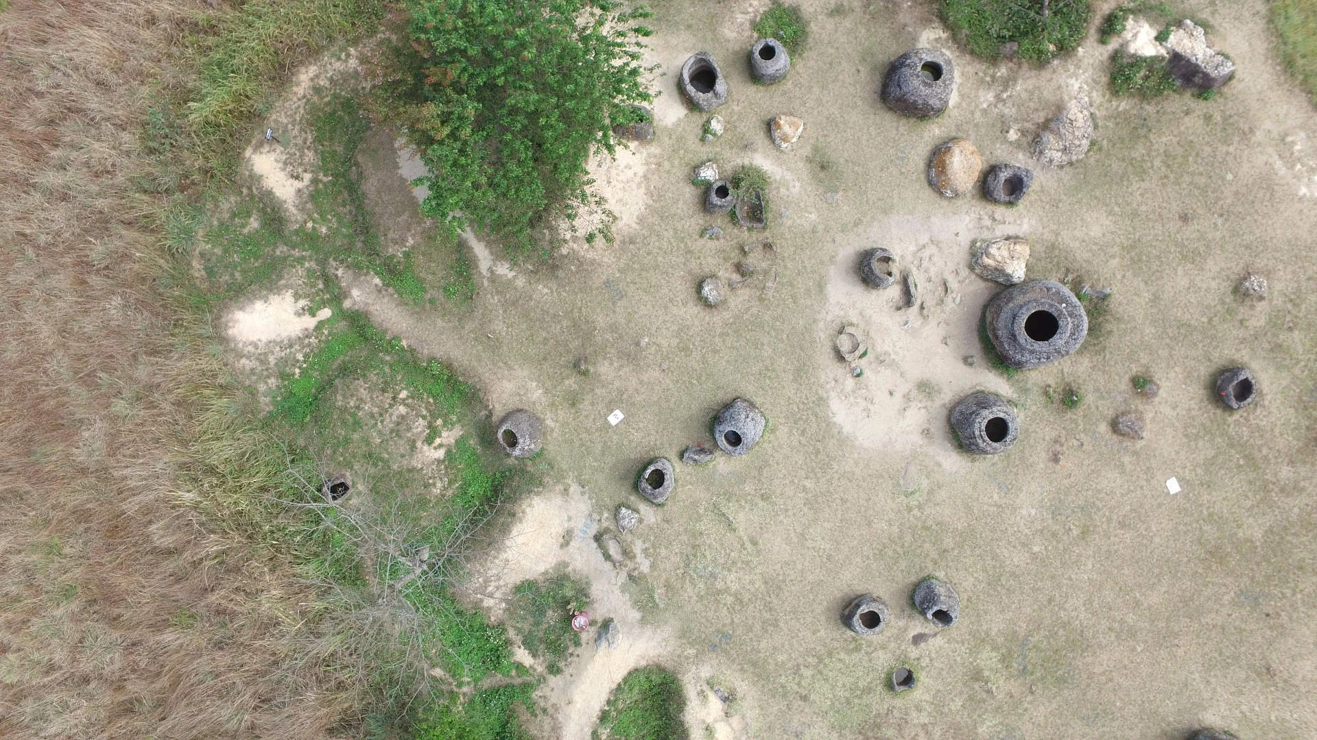 The Plain of Jars stretches over hundreds of square kilometers of green and hilly countryside around the town of Phonsavan, Laos