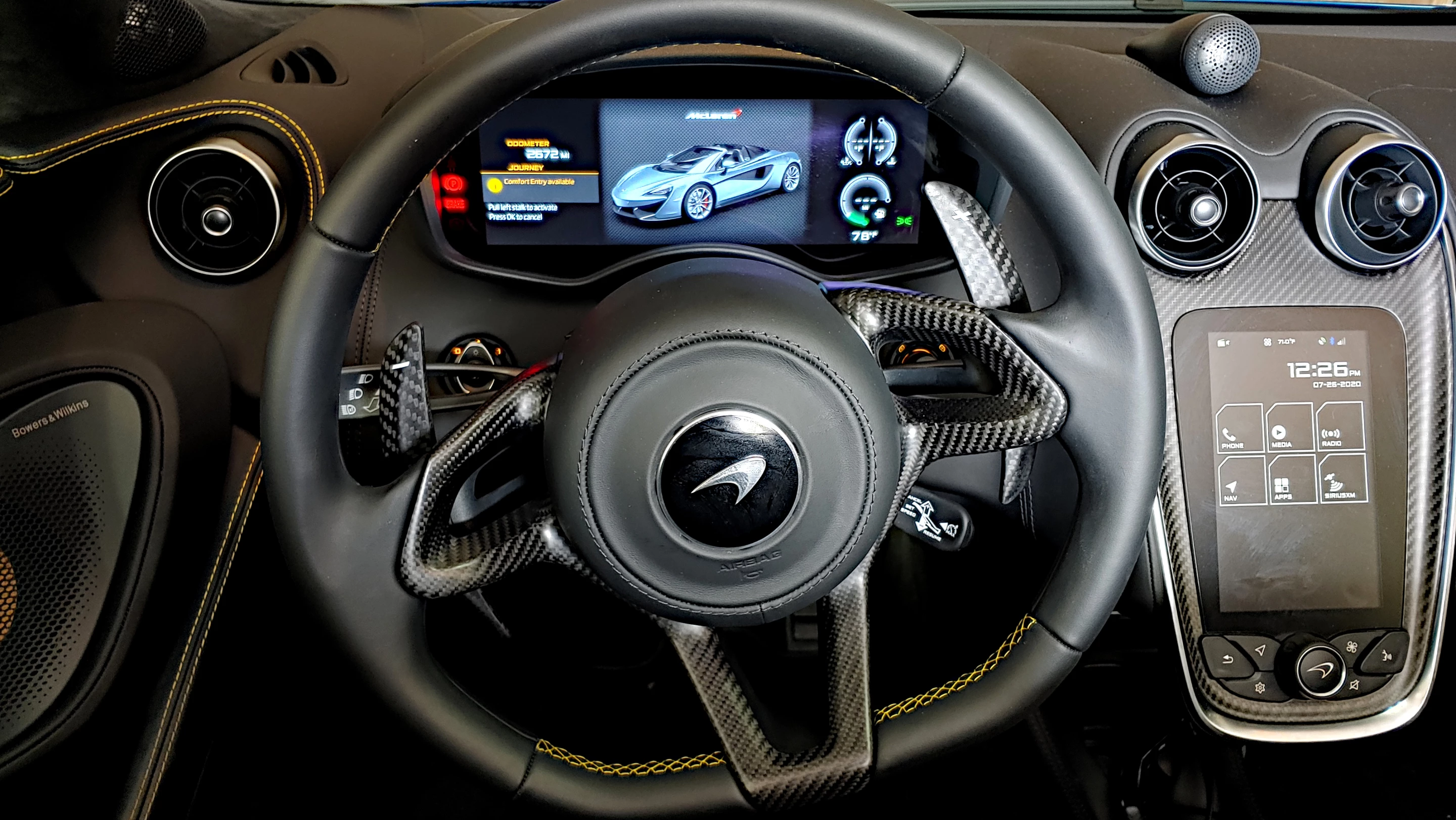 The cockpit of the McLaren 570S is simple and well laid out