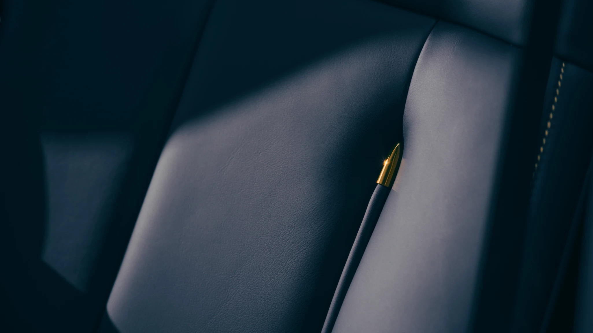 Gold bullet accent in the seating