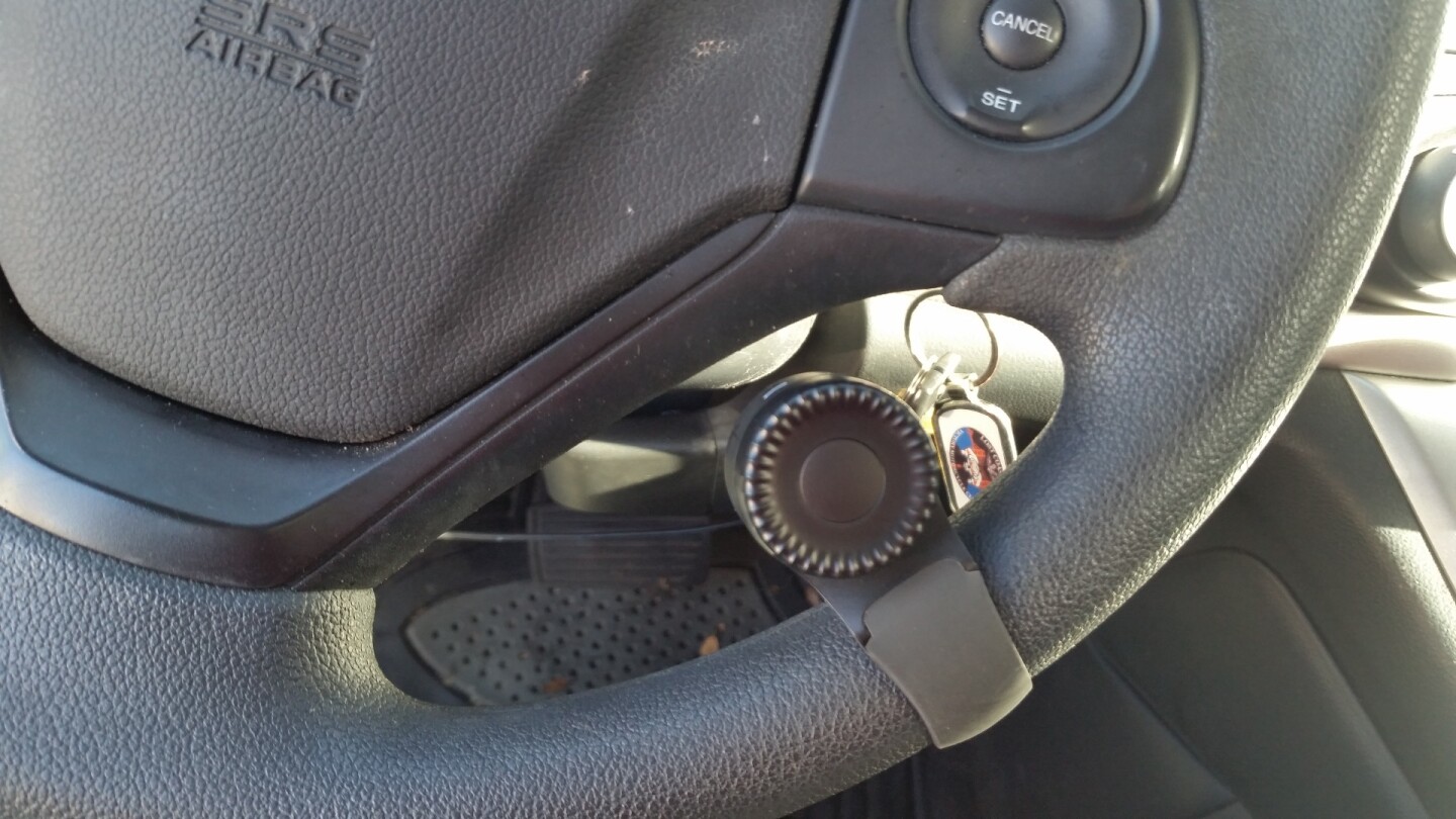 The Navdy head up display comes with a dial that is mounted on the steering wheel and lets you scroll through and choose different menu items