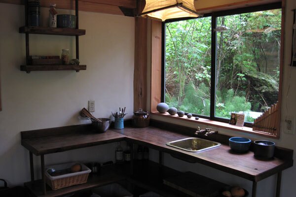 The kitchen area comprises of an L-shaped counter made from walnut slabs, which Schulz had cut from a fallen tree ten years earlier