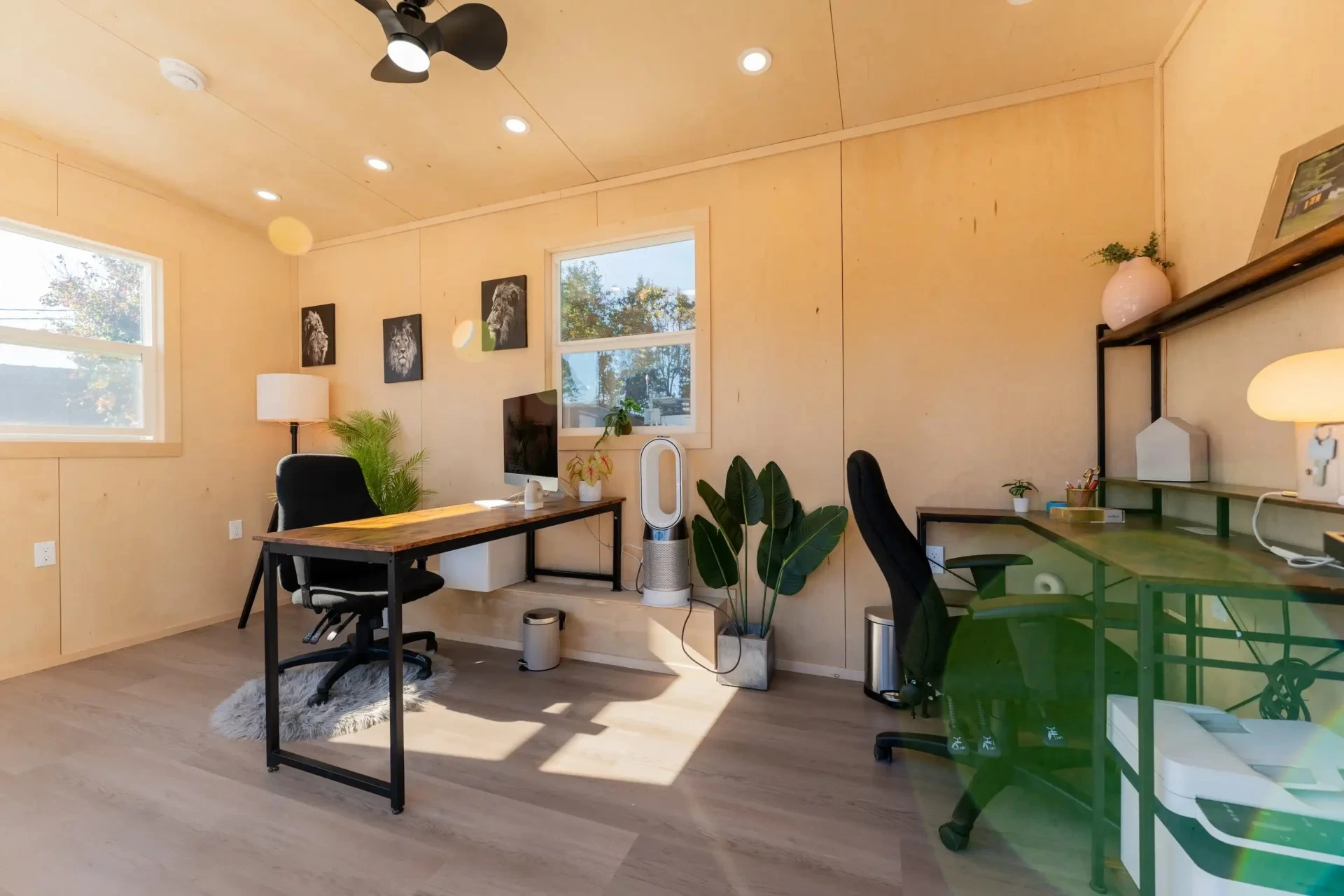 The interior is finished in plywood and has a ceiling fan installed