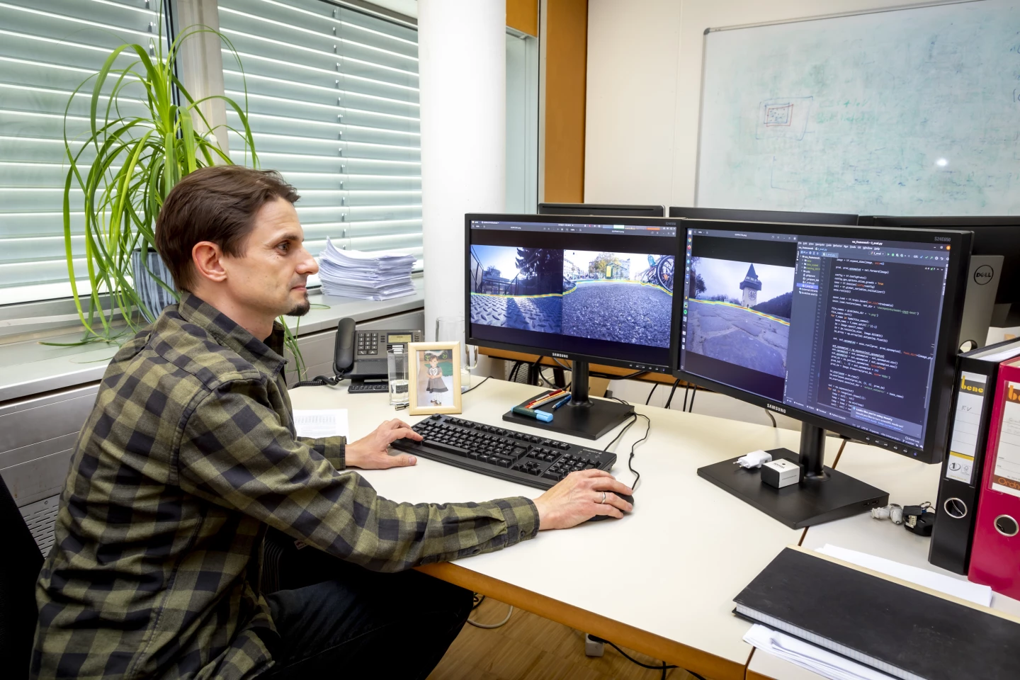 TU Graz researcher David Schinagl, analyzing three shoes-eye-view shots from the cameras