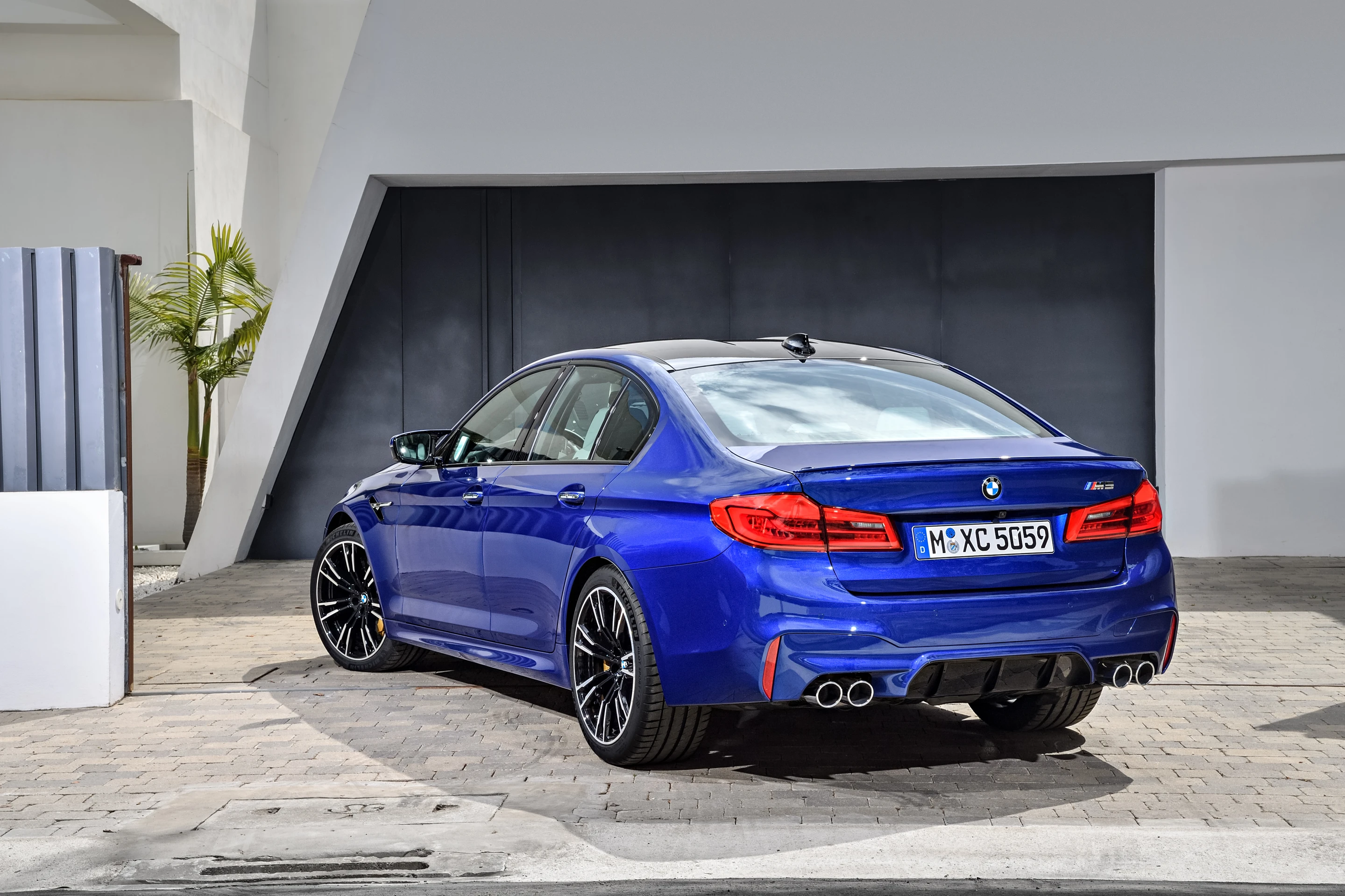 The diffuser on the new M5 is offset with quad exhaust pipes
