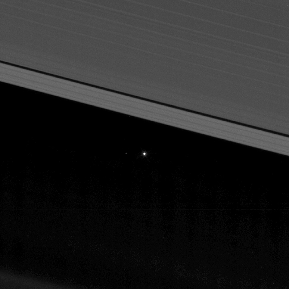 A closer crop reveals our Moon to the left of our planet