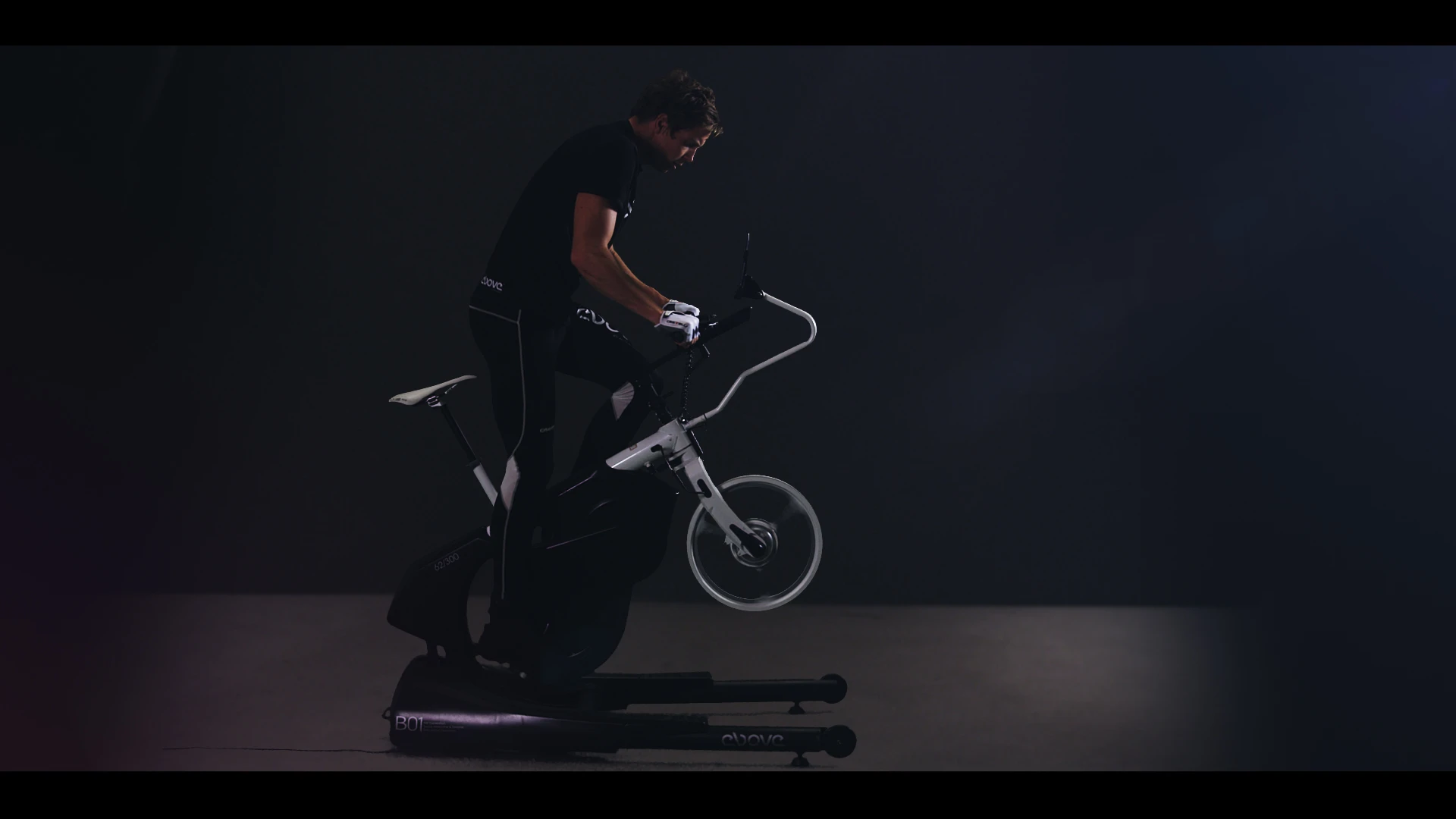 The trainer itself is gimbal-mounted on a stable base, and communicates via Bluetooth with its 14-inch touchscreen tablet