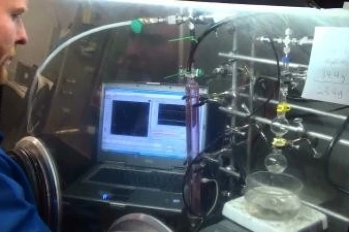 Scientist David Heldebrant demonstrates how Reversible Acid Gas Capture removes acid gases from power plant emissions