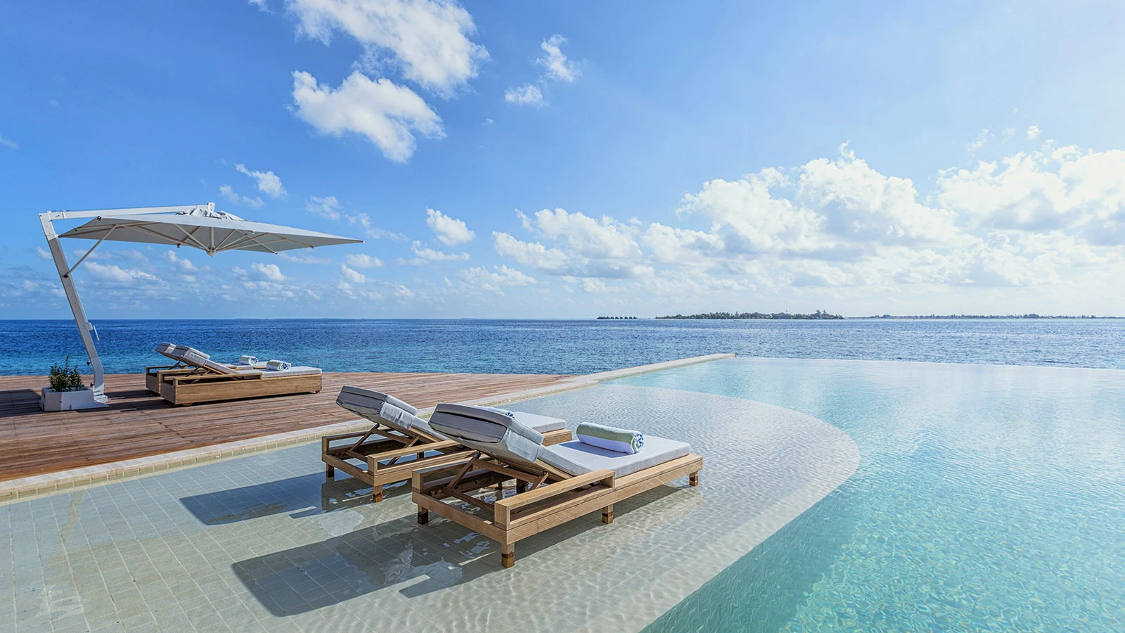 The resort features a large swimming pool for guests