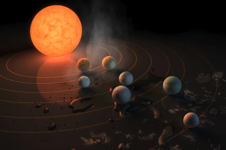 New research suggests that life could jump from one planet to another in the closely-packed TRAPPIST system in as little as 10 years