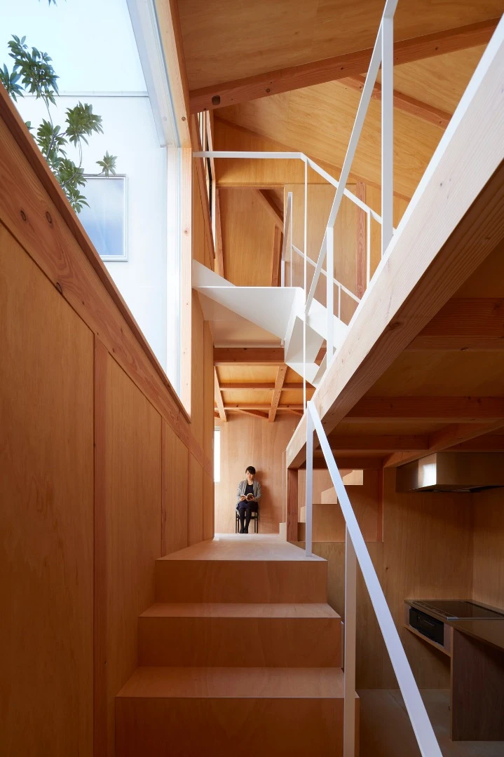 The two-story Loop House features a courtyard at its heart