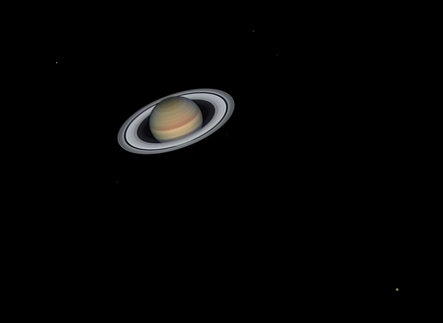 Saturn’s magnificent broad, bright rings and its bright satellites present one of the most beautiful sights visible through the telescope eyepiece. The image showcases Titan at the bottom right, Rhea on the top left, Tethys and Dione to the right of the planet and Enceladus and Mimas under the rings. Saturn’s tilt is cyclical and reaches maximum inclination every 15 years. The maximum tilt toward the Earth was in 2017, offering us the best views of the north polar hexagon and the rings at their widest. Saturn is now beginning to tilt in the opposite direction, meaning the next time the rings are best seen will be in 2032, but we will only see the southern side of the rings and Saturn’s polar hexagon will not be visible from the Earth.Long Bay, Barbados, 5 July 2018