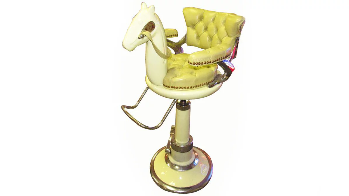 A period piece of exquisite quality with unmarked porcelain and detailed soft leatherwork plus hydraulic height adjustment that works flawlessly. This 1930s Children's Barber Shop Chair sold for $4,025 at Barrett-Jackson's Scottsdale, 2018 auction.