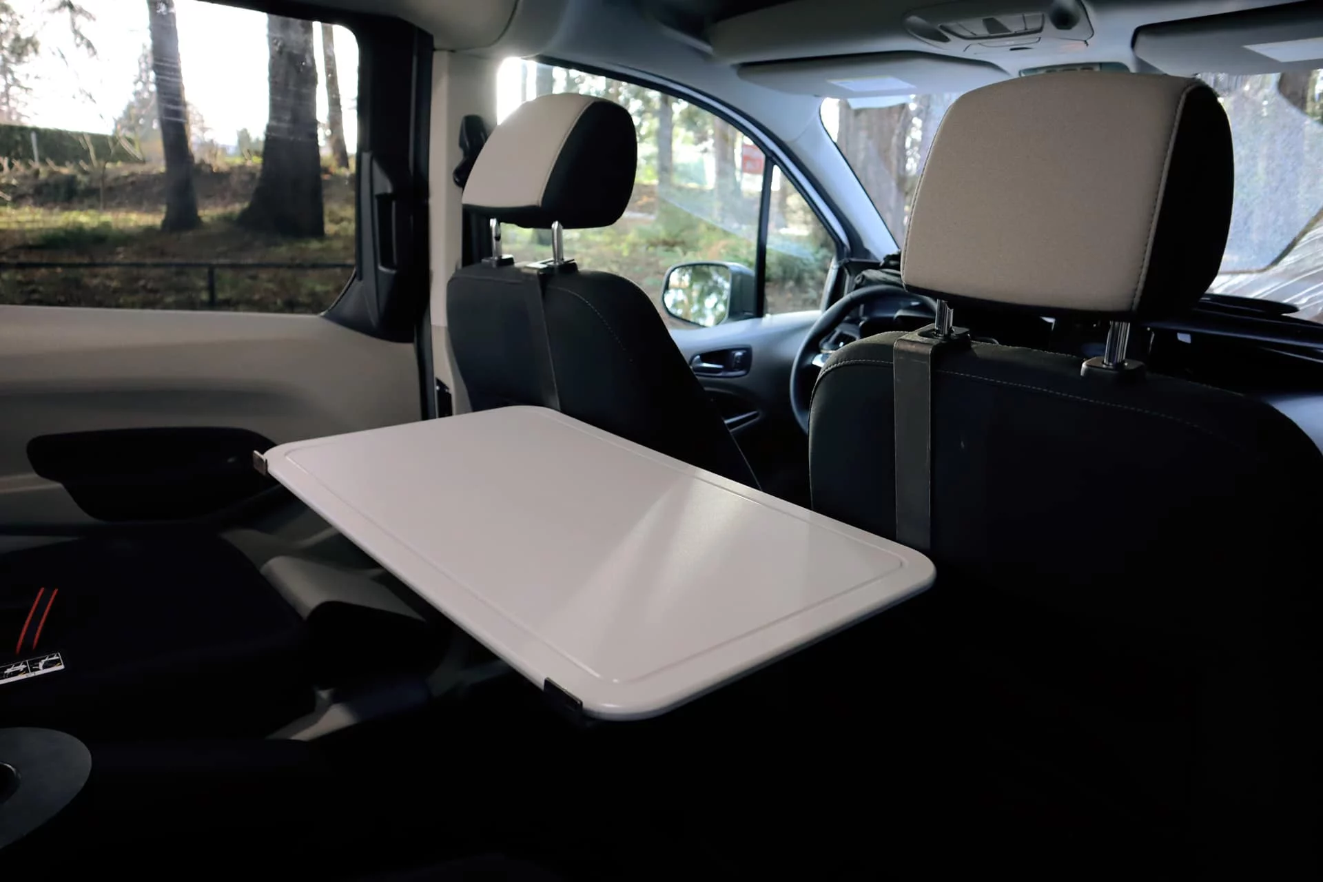 The cutting board doubles as a multi-position table