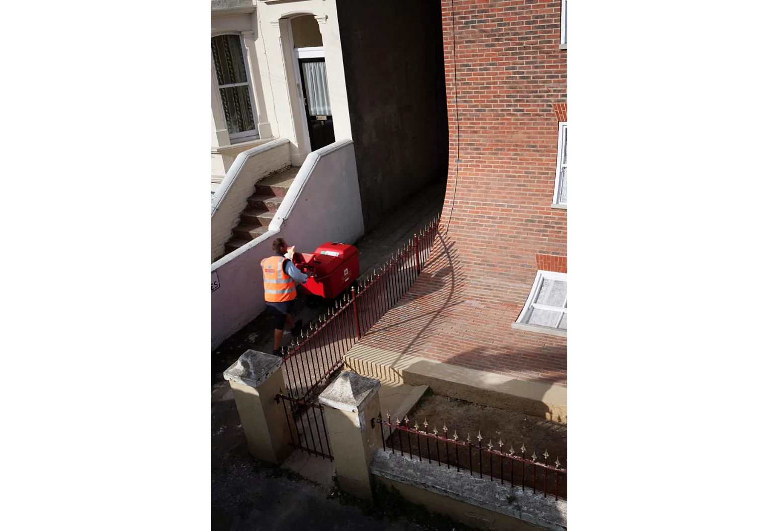 From the knees of my nose to the belly of my toes gave the impression a facade was slipping off the building, revealing a top floor usually hidden behind brickwork
