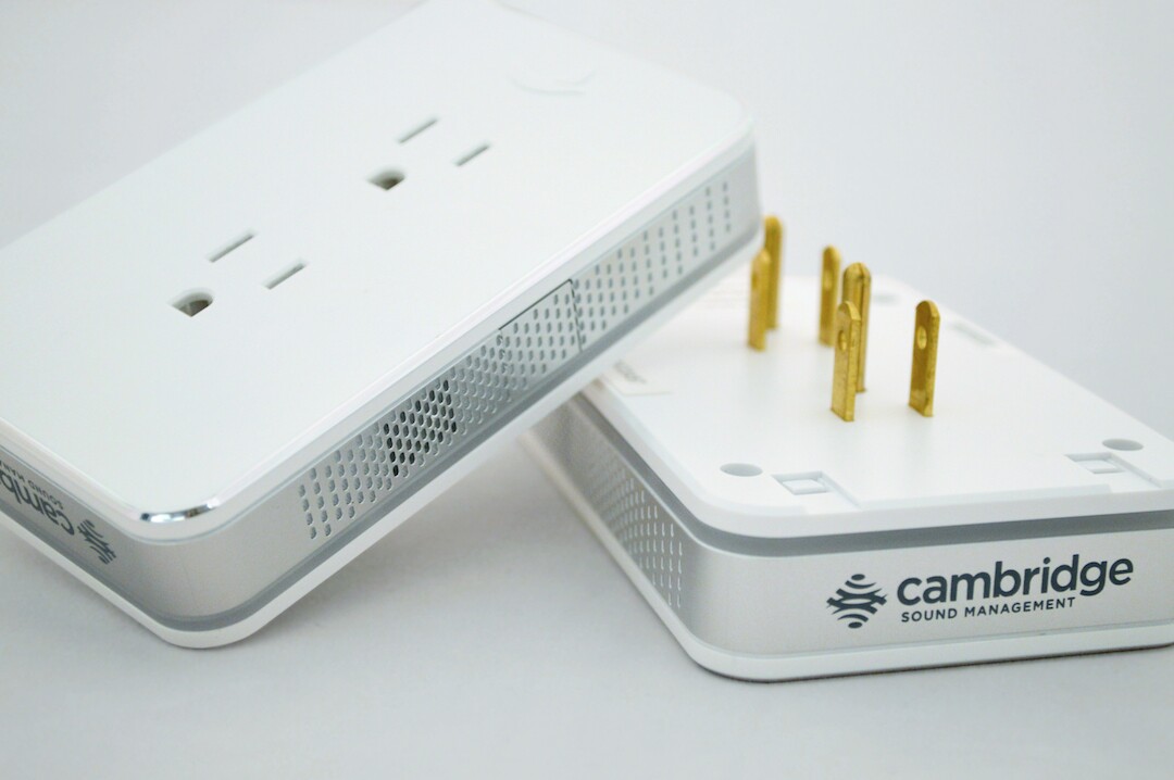 Nightingale plugs into a wall socket, and contains two outlets on the front to make up for the ones it's hogging