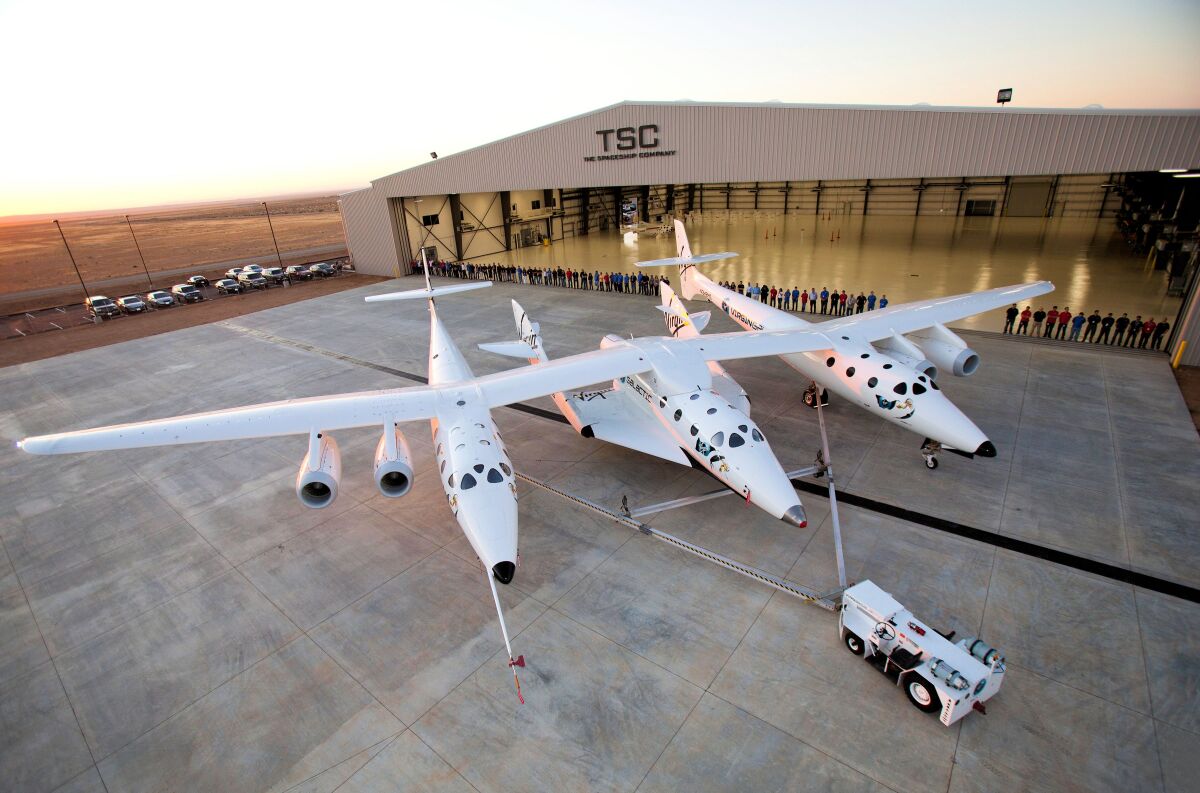 White Knight Two and SpaceShipTwo being towed to the runway (Photo: Virgin Galactic)