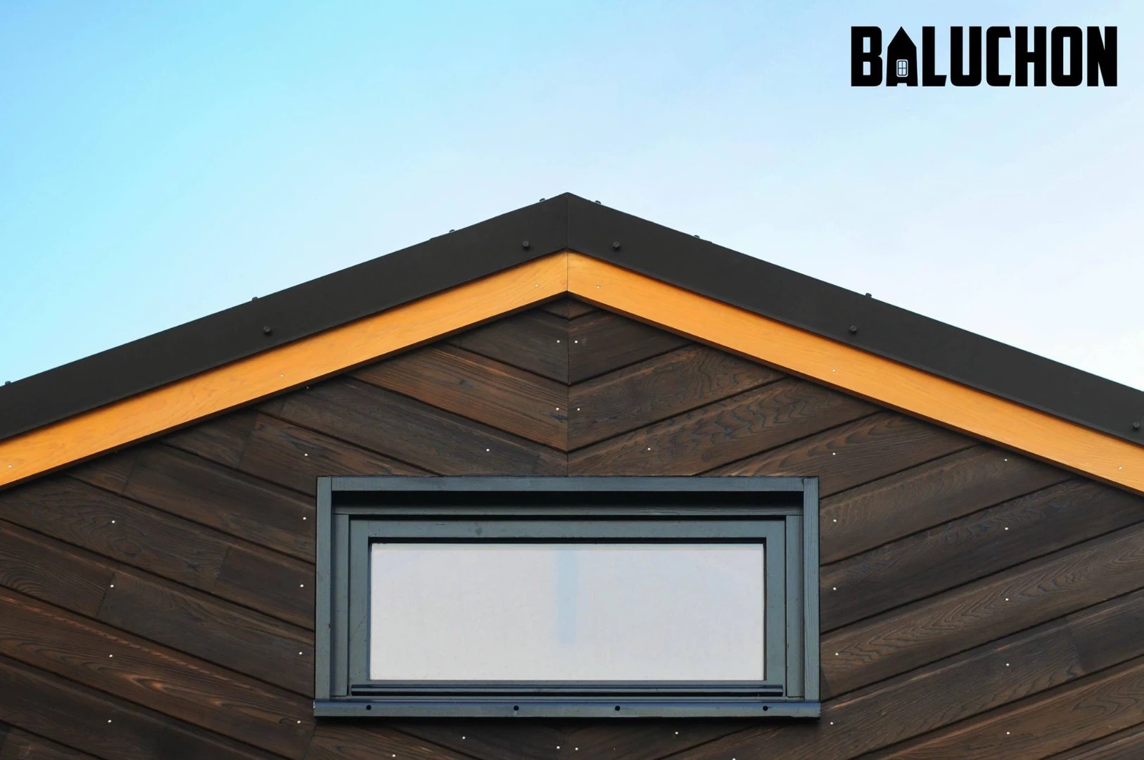 The Calypso's siding includes a section of wood charred in the Japanese Shou Sugi Ban method