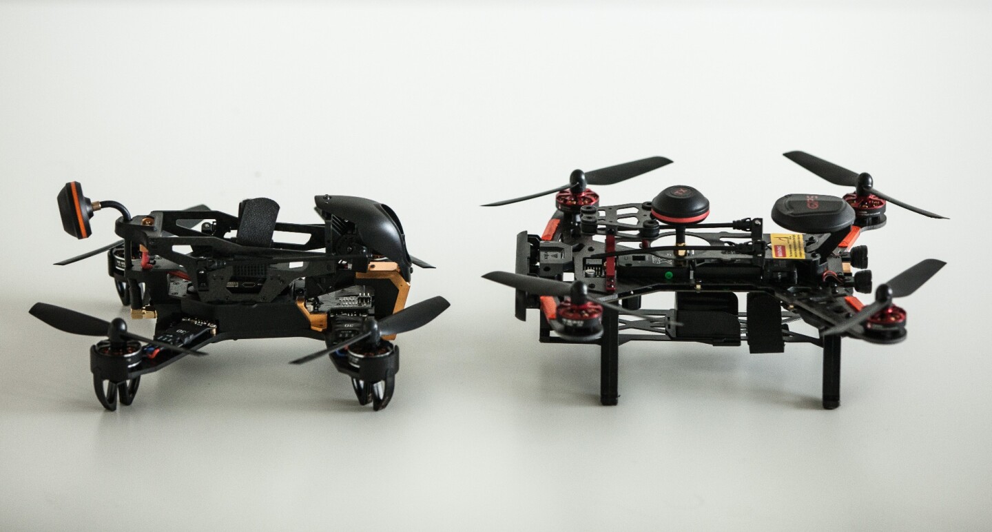 F210 on the left, Runner 250R on the right - note the thicker, hardier carbon shell on the F210 and the much improved battery compartment
