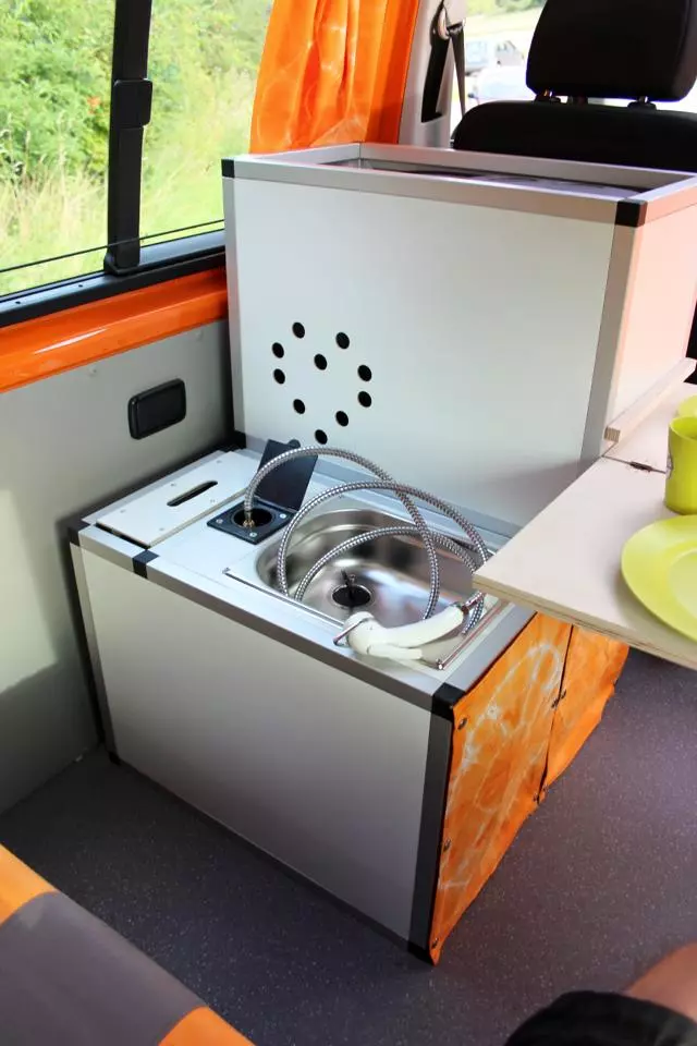 The three modules contain primary camping equipment like the sink