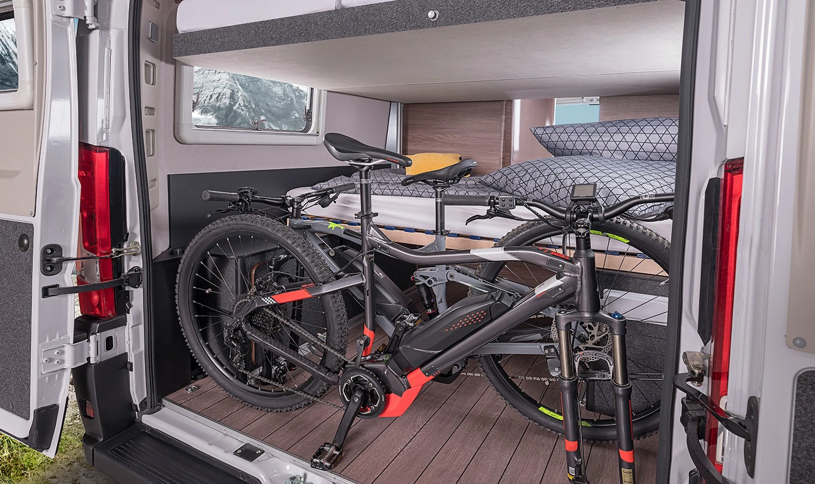 Knaus even manages to squeeze two electric bikes in back of the single lower bed