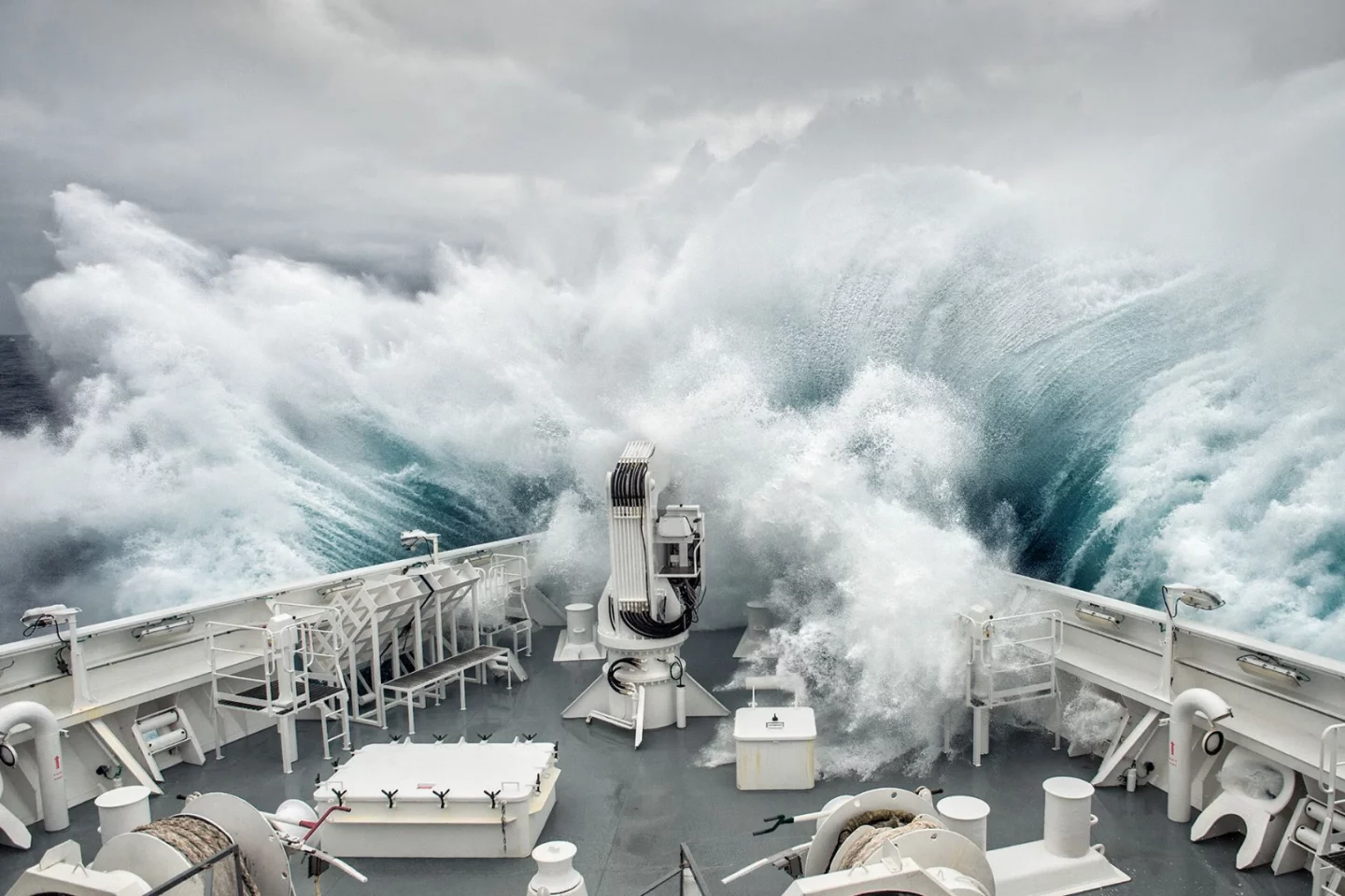 Third place in Journeys and Adventures. In the Drake Passage, between Cape Horn and Antarctica, a 12-meter wave pounds the boat's forecastle with its enormous splashes