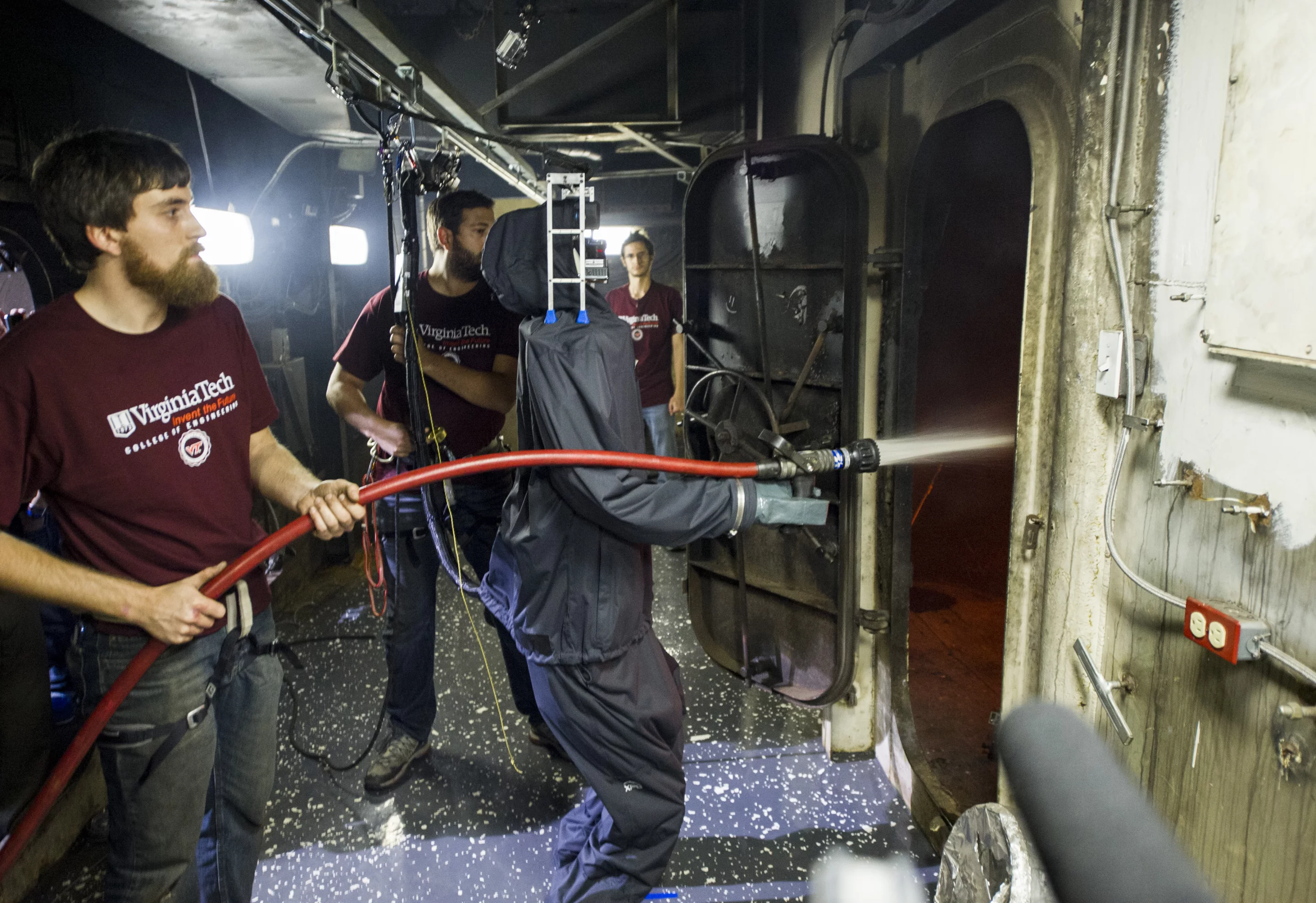 SAFFiR in a rain suit putting out a shipboard fire (Photo: US Navy)