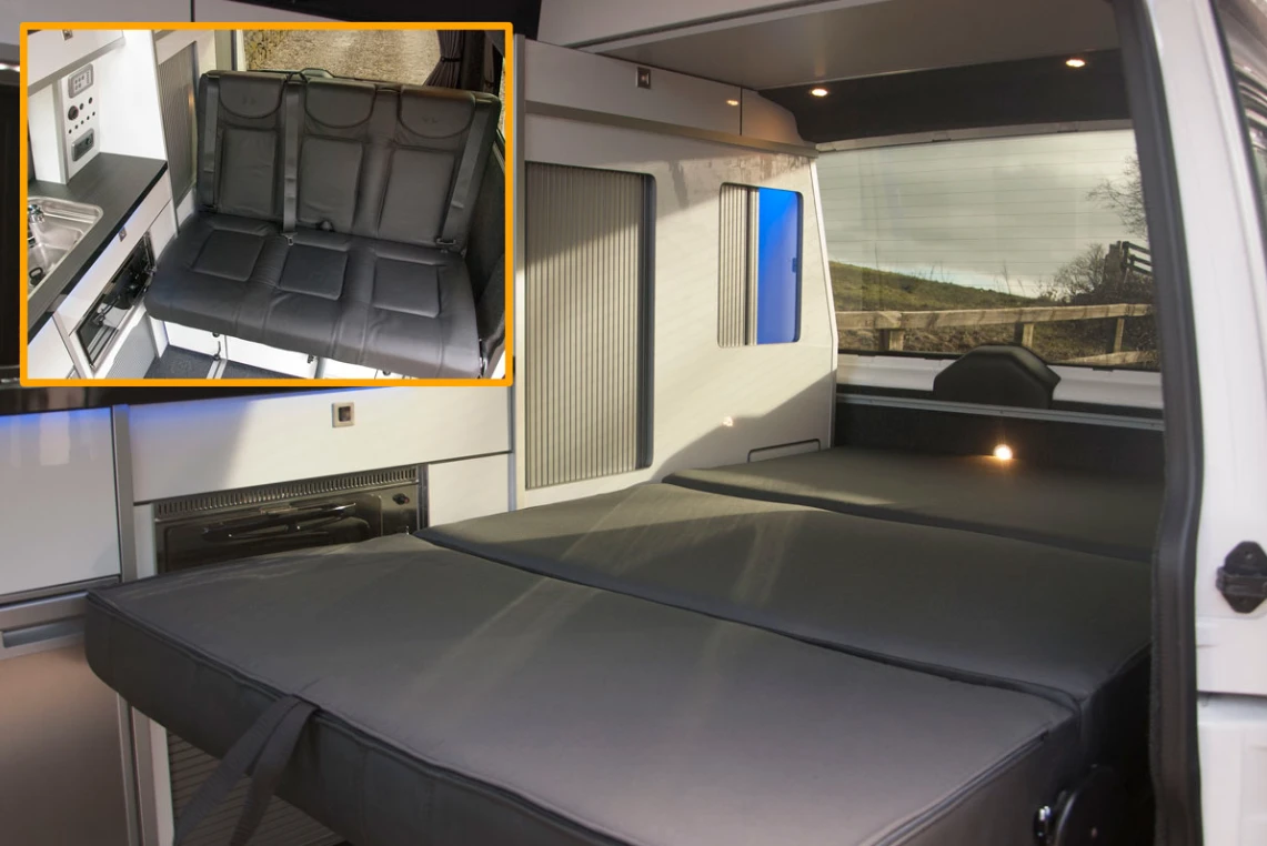 The seats fold into a two-person bed