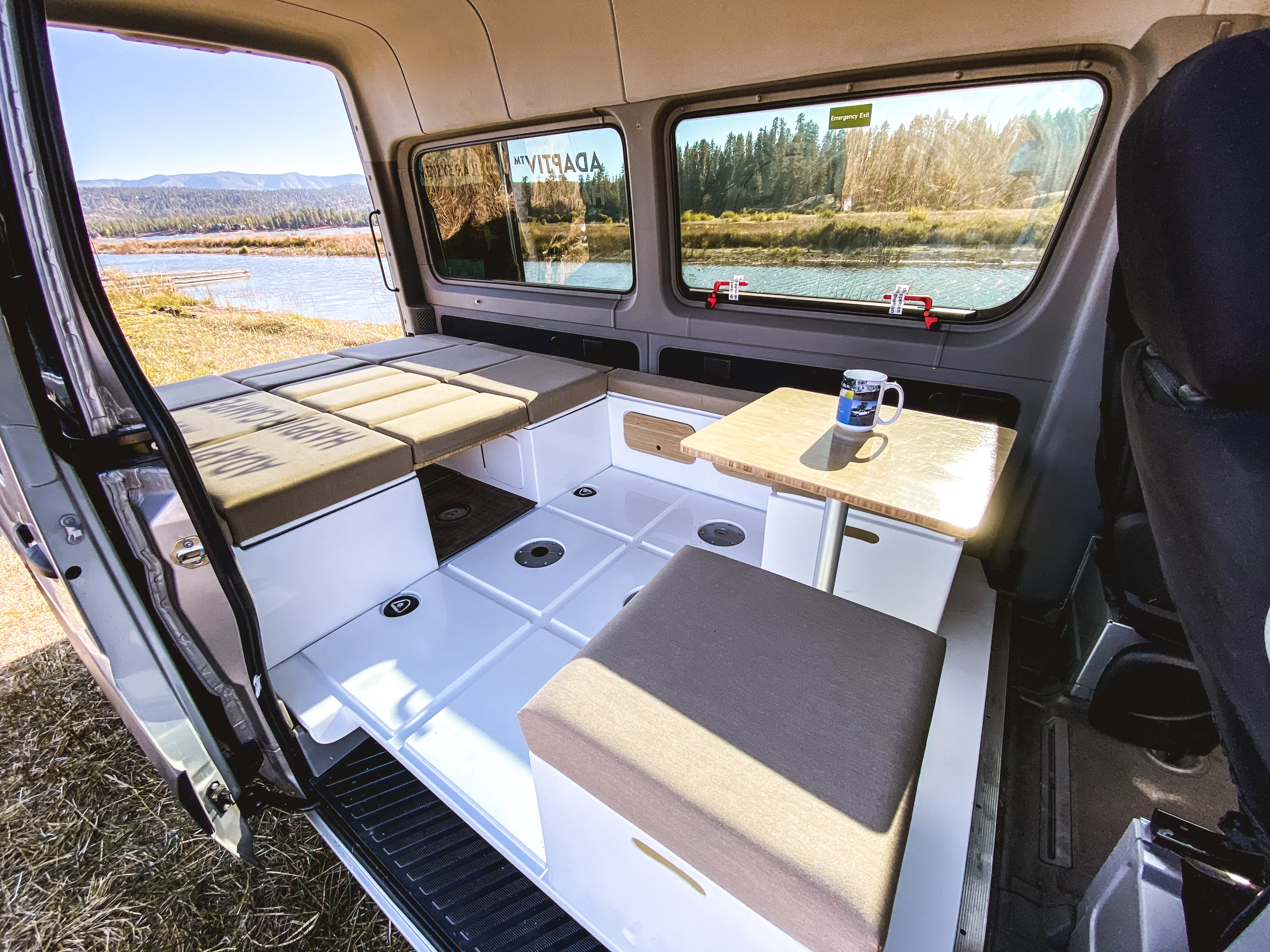Here's an Adaptiv take on the rear bed/front dinette layout