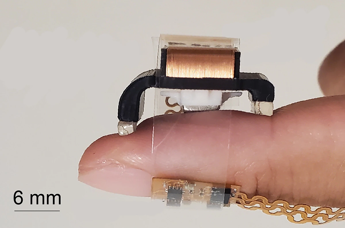 Barely the size of a fingertip, this device includes a magnet, wire coils, a battery, accelerometer, and Bluetooth chip