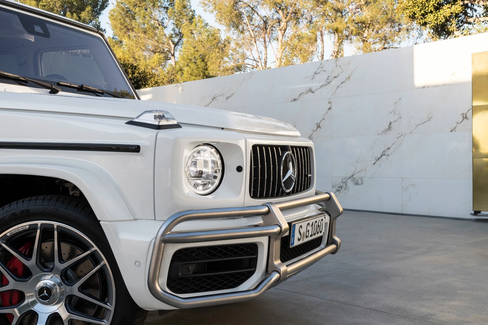 Larger side intakes, framed by the AMG tubular bumper guard, are also indicative of the higher power output the AMG G 63 has