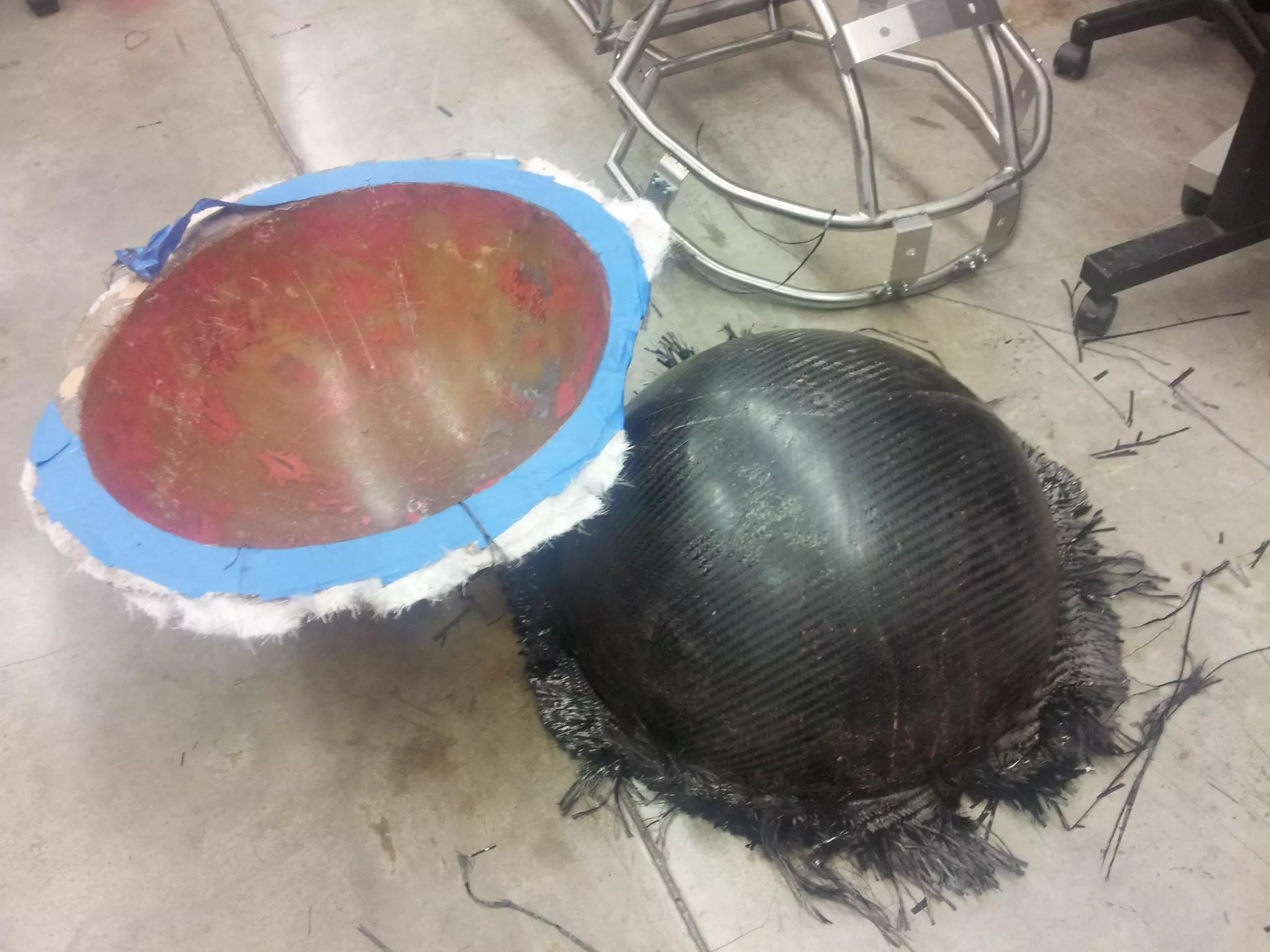 The carbon fiber and fiberglass shells that form the front and rear spheres