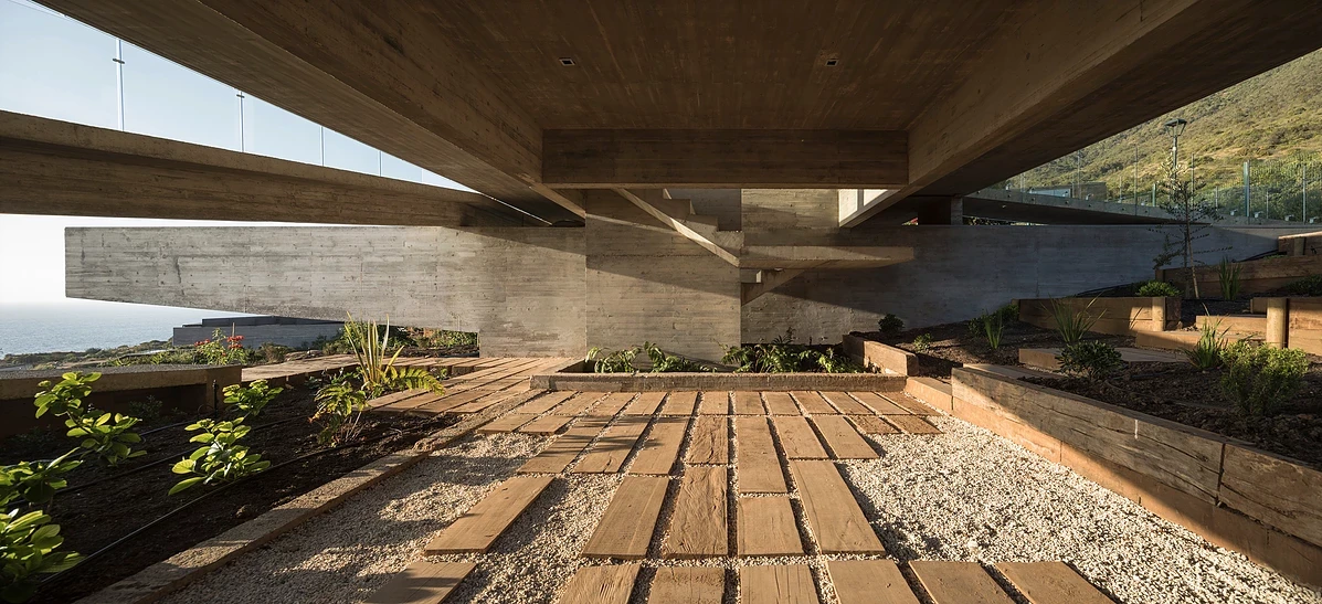 Beneath the upper floor of the La Casa H, by Felipe Assadi Arquitectos