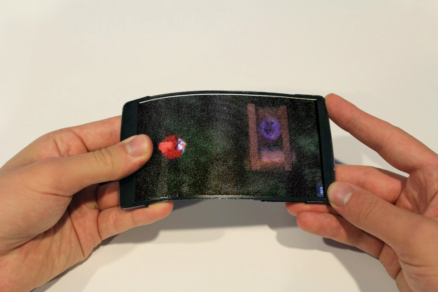 Bending the phone activates the slingshot in a 3D version of Angry Birds