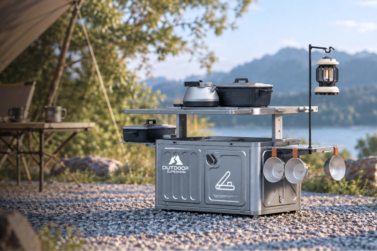 Modular camp kitchen packs down into a metal case