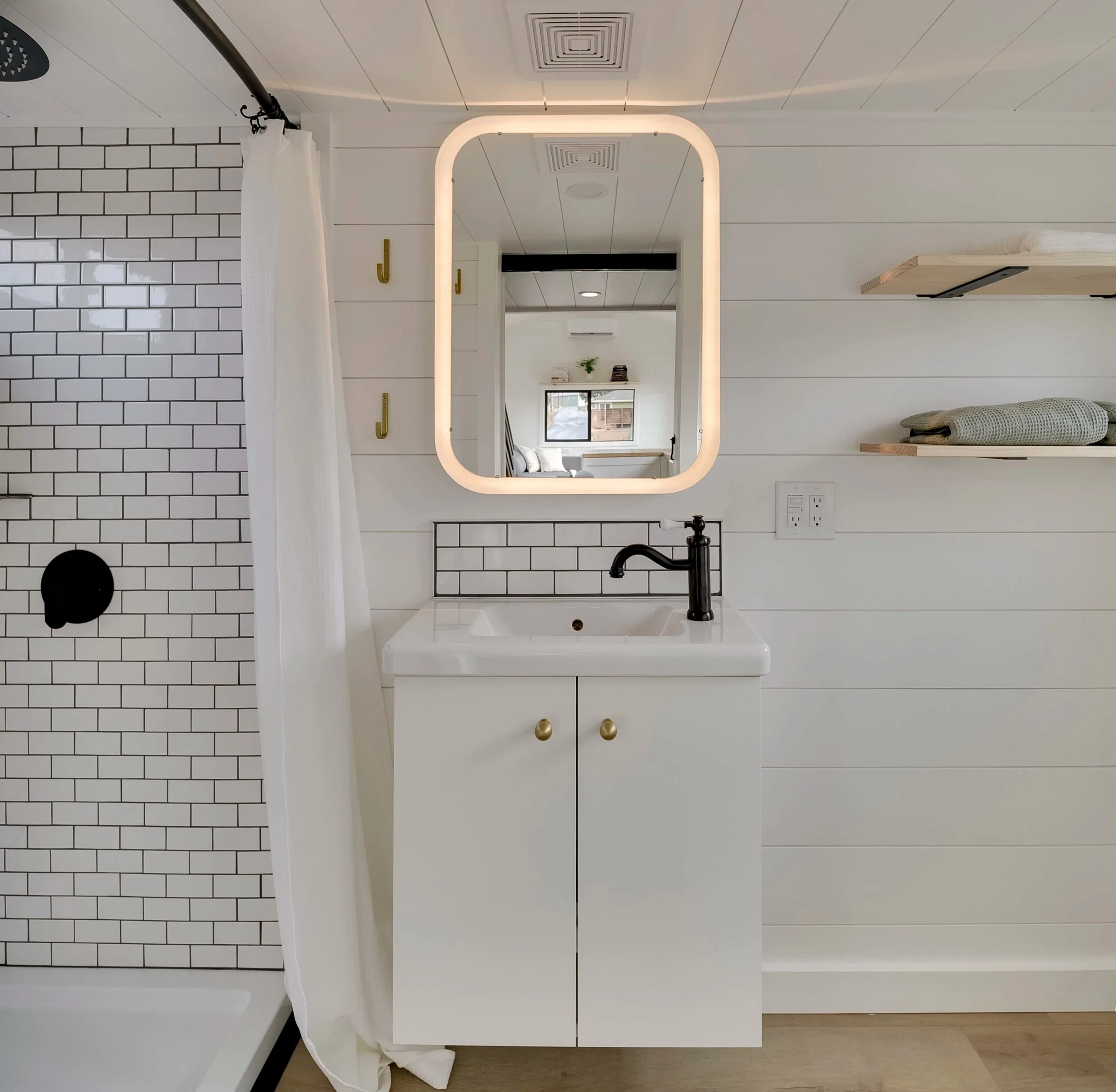The Ochoco's bathroom includes a shower, sink, and an incinerating toilet