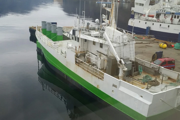 The fishing boat, with its four chambers visible at the front