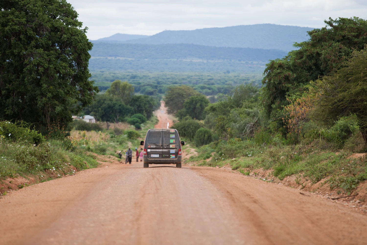 Approaching some local people at Kondoa Dodoma - who will doubtless ask Chevrin to raise the hood