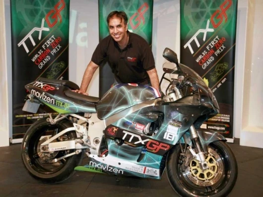 TTX GP founder Azhar Hussain and the bike he commissioned, the prototype TTX01.