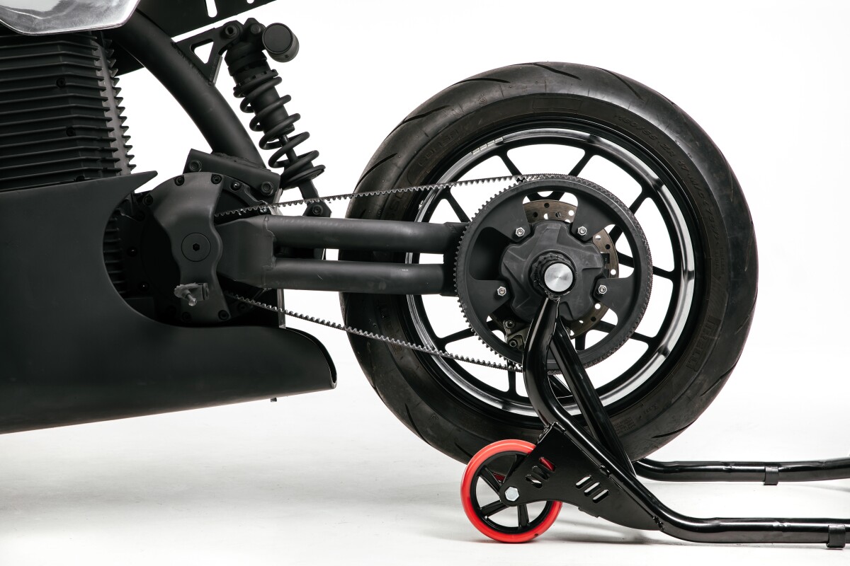 Twin tube single sided swingarm and carbon belt drive look trick