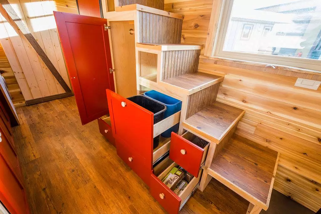 Davis's 22 ft Off-Grid Tiny Home features a storage-integrated staircase