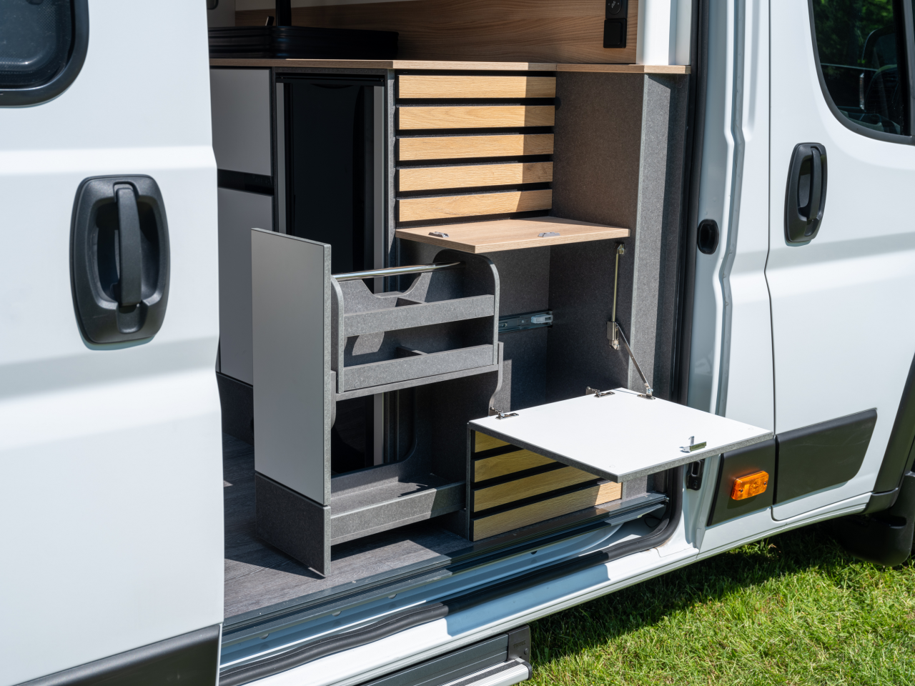 Much like Volkswagen has done with its newest California design, Weinsberg creates an indoor/outdoor kitchen space to inspire campers to spend more time outside the van walls