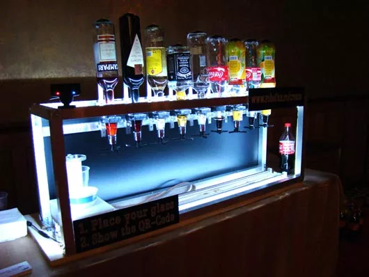 The Social Drink Machine is a robotic bartender that takes your order via Facebook or Twitter apps on your mobile phone