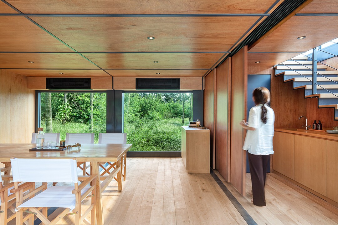 The space can be closed off with the use of the sliding wooden panels