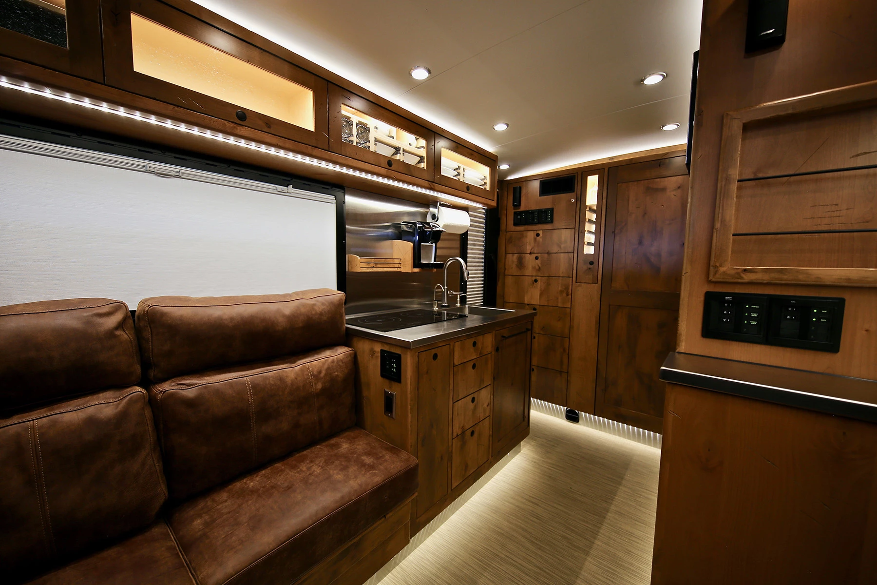 The Boulder floor plan includes vis-a-vis medium sofas up front